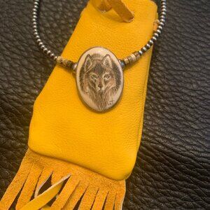 vintage native american wolf scrimshaw pendant